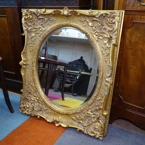 1862 - A decorative gilt finished bevelled-edge wall mirror, W70cm, H80cm