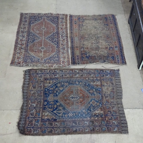 1872 - 3 Antique red ground Afghan rugs, 125cm x 85cm, 115cm x 85cm, and 130cm x 100cm (3)