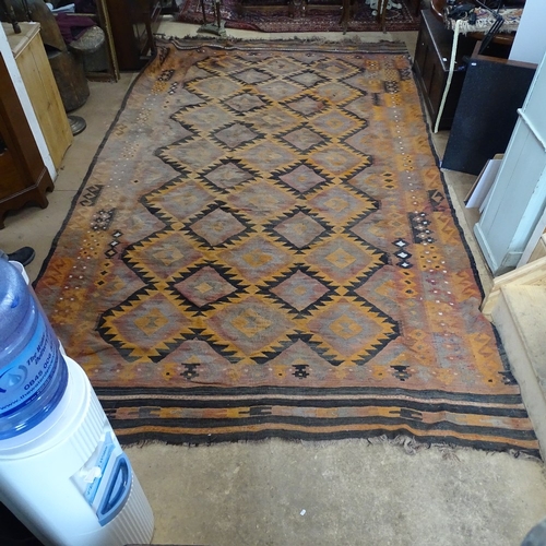 1873 - A large red and orange ground Kilim carpet, 415cm x 250cm