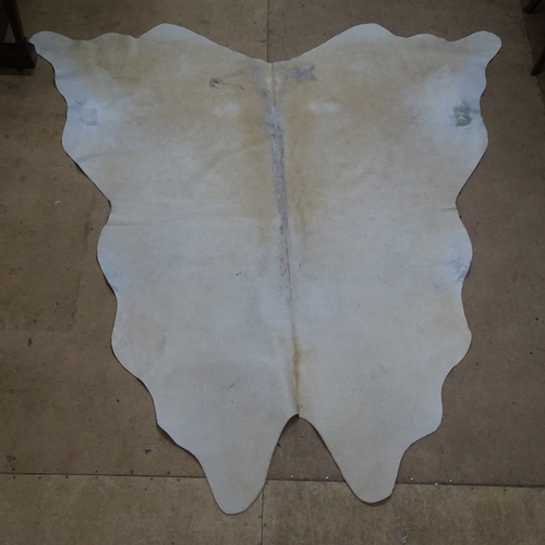 1877 - A full size cowhide, 220cm x 215cm