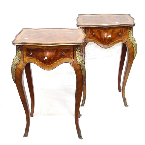 1884 - A pair of Continental crossbanded walnut side tables, with single frieze drawer, cabriole legs and b... 