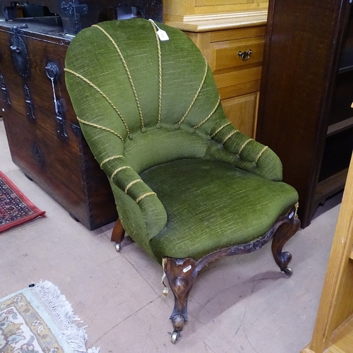 1896 - A Victorian iron-framed upholstered armchair, on carved walnut cabriole legs