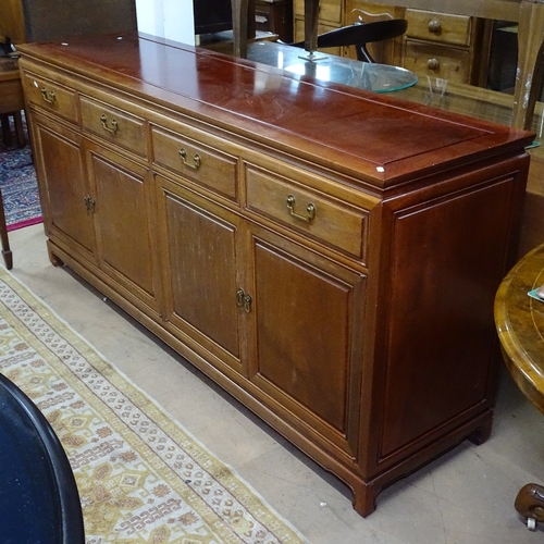 1906 - A Chinese design 3-piece dining room suite, comprising a rectangular dining table with 2 spare leave... 