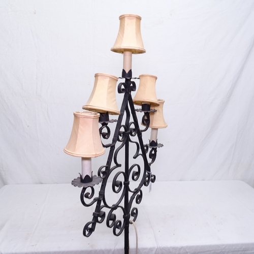 1914 - A scrolled wrought-iron floor standing chandelier, H168cm