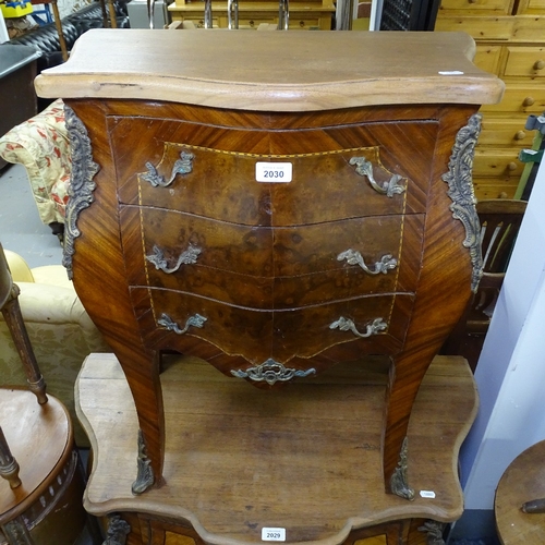 2030 - A Continental walnut bombe chest, with short drawers, and ormolu mounts, W60cm, H72c, D38cm