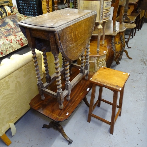 2032 - A mahogany brass-inlaid coffee table, an oak gateleg table, and a stool (3)