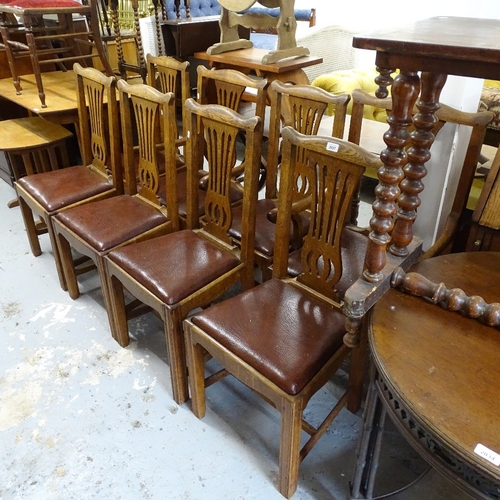 2037 - A set of 8 oak dining chairs, with pierced lyre backs and drop-in seats (6 and 2)