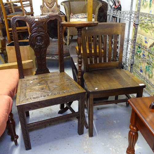 2040 - A carved oak hall chair with figural back, another, and a stained beech jardiniere stand (3)