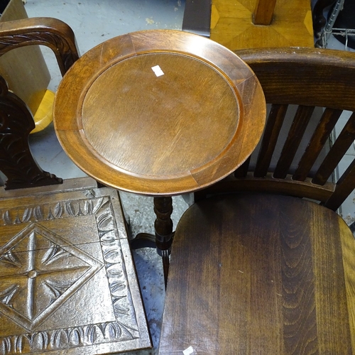 2040 - A carved oak hall chair with figural back, another, and a stained beech jardiniere stand (3)