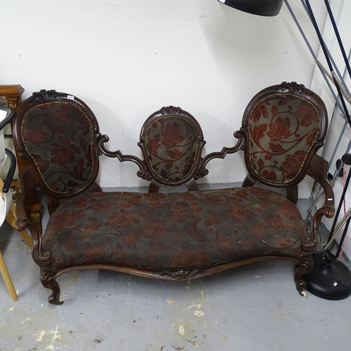 2050 - A Victorian carved mahogany-framed salon settee, L180cm