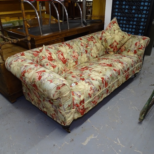 2062 - A modern upholstered rollover arm Chesterfield settee, with floral loose cover, L200cm, H70cm, seat ... 