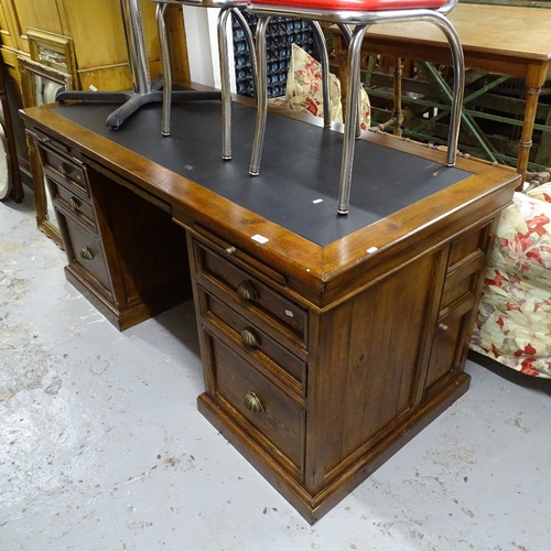 2066 - A reclaimed timber twin-pedestal writing desk, with slides and fitted drawers, L175cm, H83cm, D80cm,... 