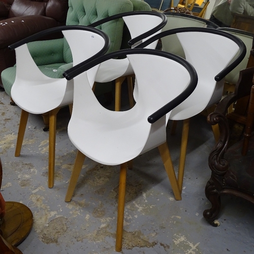 2078 - A set of 4 contemporary designer plastic shell chairs on beech legs