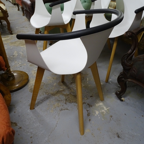 2078 - A set of 4 contemporary designer plastic shell chairs on beech legs