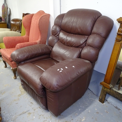 2081 - A brown leather-upholstered reclining armchair