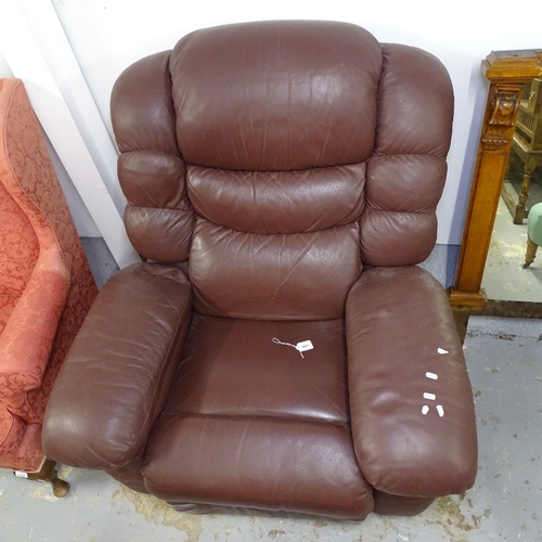 2081 - A brown leather-upholstered reclining armchair