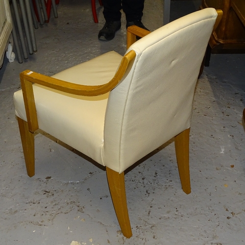 2100 - A contemporary designer cream leather open armchair