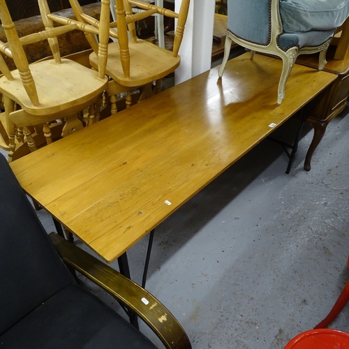 2108 - An Antique plank-top pine tressel table, on folding metal base, L182cm, H76cm, D65cm