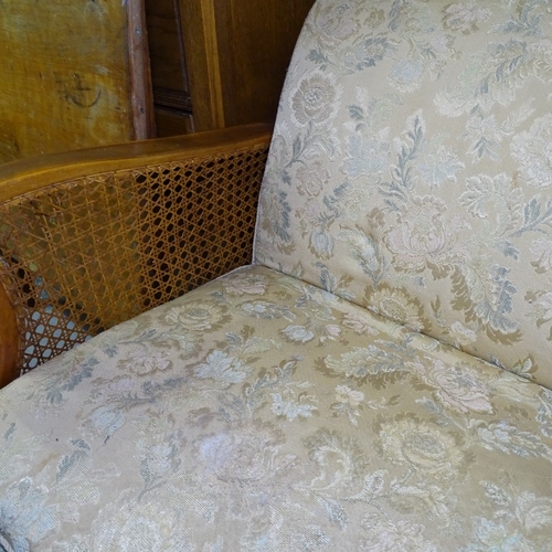 2124 - An Edwardian upholstered bergere 3-seater settee, L200cm