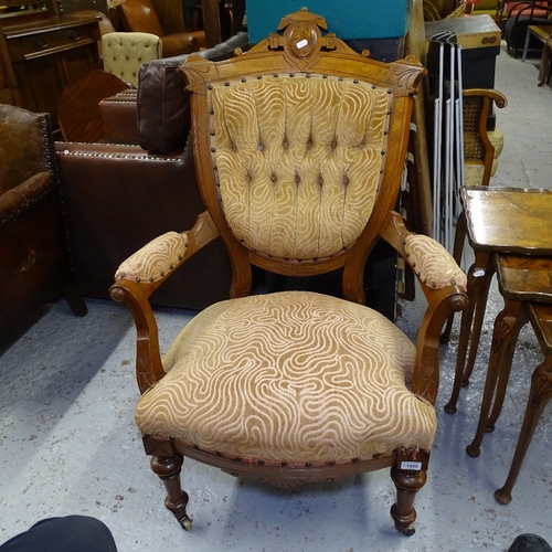 2130 - A Victorian walnut-framed and upholstered open-arm bedroom chair, and a walnut nest of 3 occasional ... 