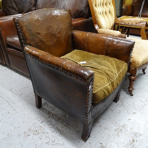 2131 - A small early 20th century studded leather-upholstered armchair