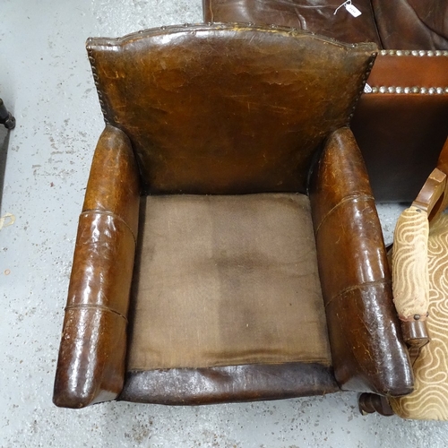 2131 - A small early 20th century studded leather-upholstered armchair