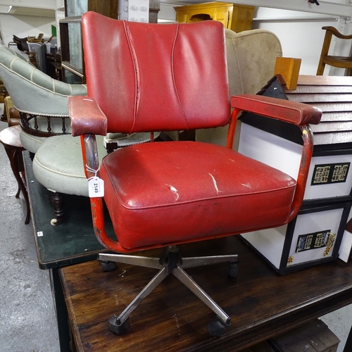 2149 - A Vintage swivel desk chair, with tubular steel arms and 5-star chromed base