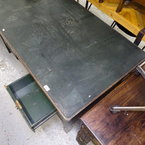 2150 - An industrial green painted metal desk, with fitted drawers, W146cm, H78cm, D76cm, kneehole width 53... 