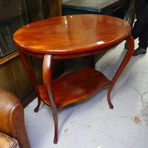 2152 - A walnut nest of 3 occasional tables, and an oval mahogany 2-tier occasional table