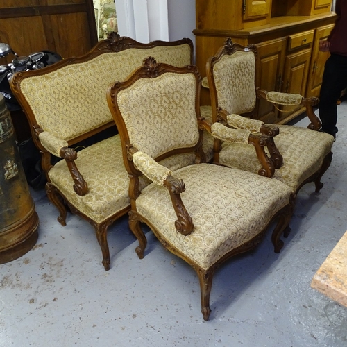 2187 - A French carved framed 3-piece suite, comprising a pair of open armchairs, and a 2 seater settee