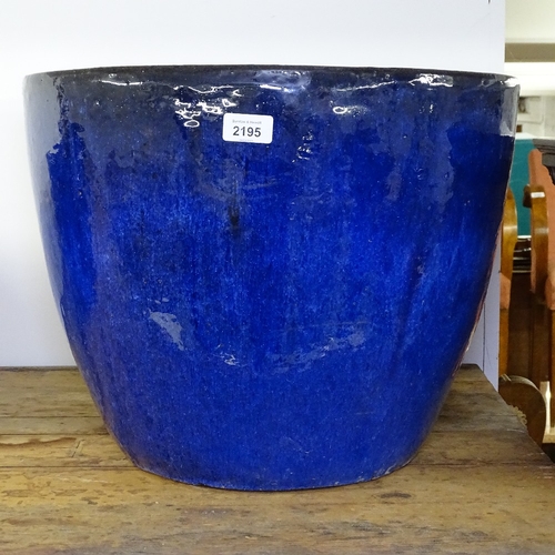 2195 - A blue glazed terracotta garden pot, W45cm, H37cm