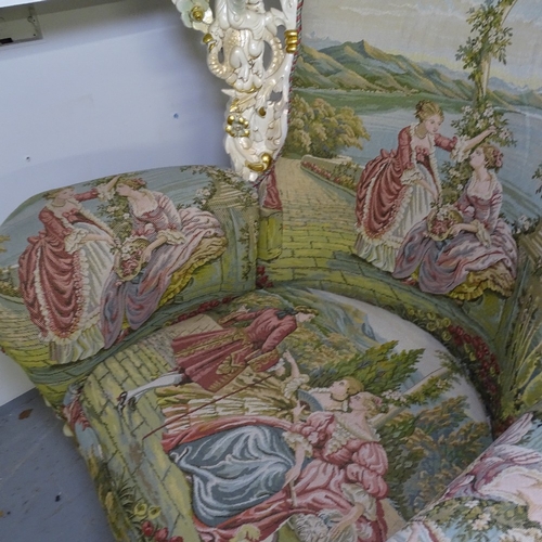 2199 - A pair of matching bespoke made armchairs, with carved winged horse and figure crests, made in Egypt... 