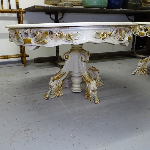 2202 - A bespoke made circular coffee table, with an inset carved and pierced gilt floral panel, made in Eg... 