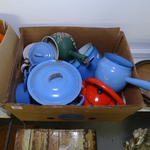 2207 - A quantity of blue, green and red enamelled pots, pans etc