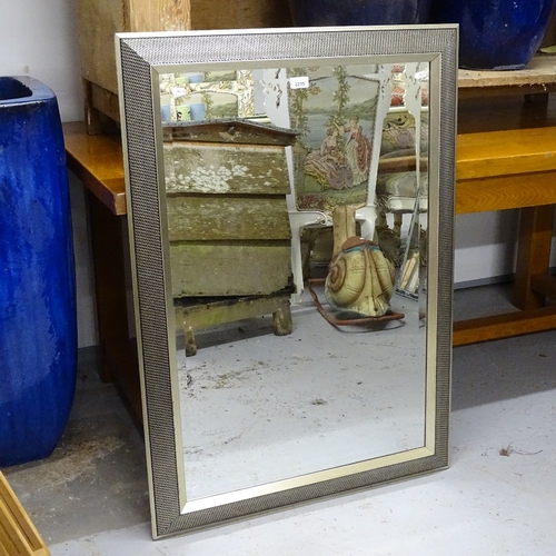 2215 - A modern silvered-framed bevelled-edge wall mirror, W75cm, H107cm