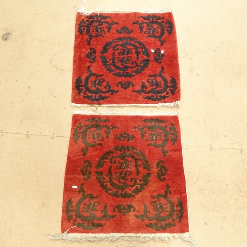 2229 - 2 red ground Chinese mats with dragon decoration, 66cm x 66cm