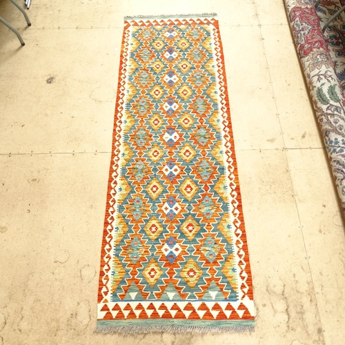 2232 - A Kilim runner, 242cm x 82cm