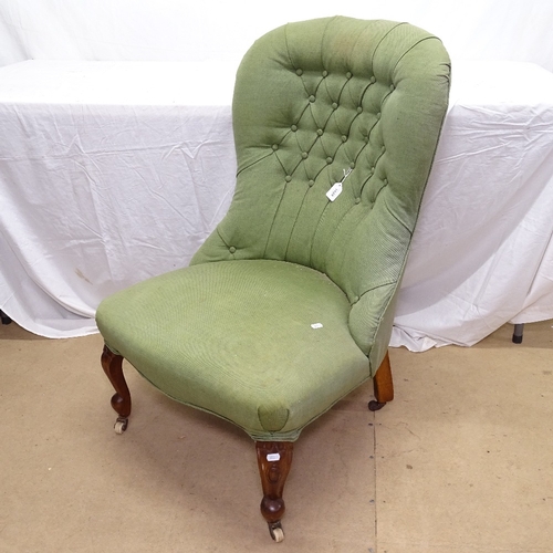 1929 - A Victorian button-back upholstered nursing chair, on cabriole legs