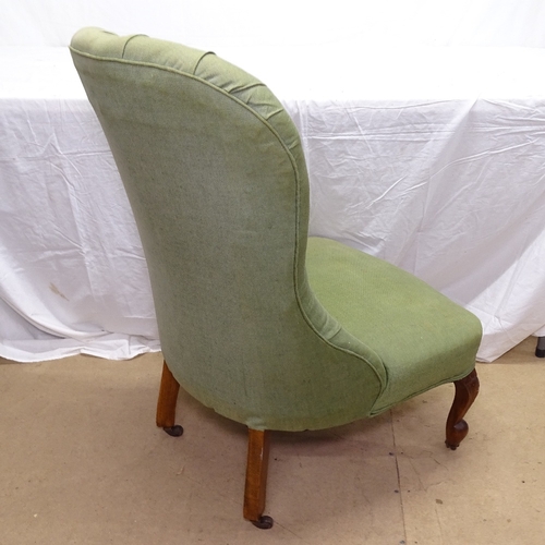 1929 - A Victorian button-back upholstered nursing chair, on cabriole legs