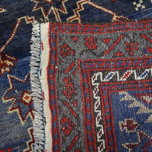 1930 - A red ground Beluchi prayer rug, 131cm x 81cm