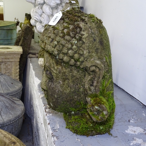 1953 - A weathered concrete Buddha's head, H40cm