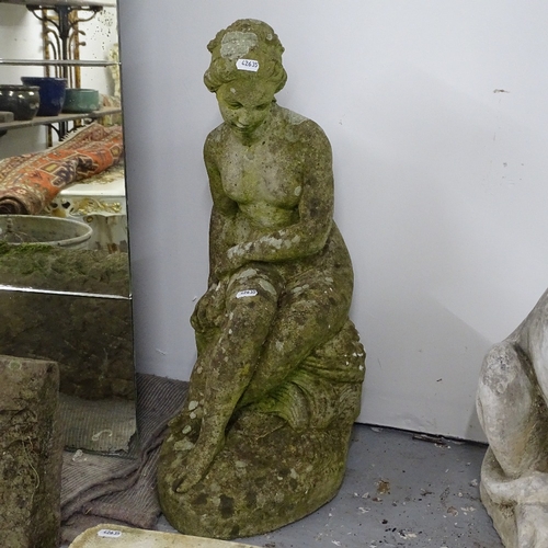 1956 - A weathered concrete garden statue, H64cm, and a concrete plinth, H58cm