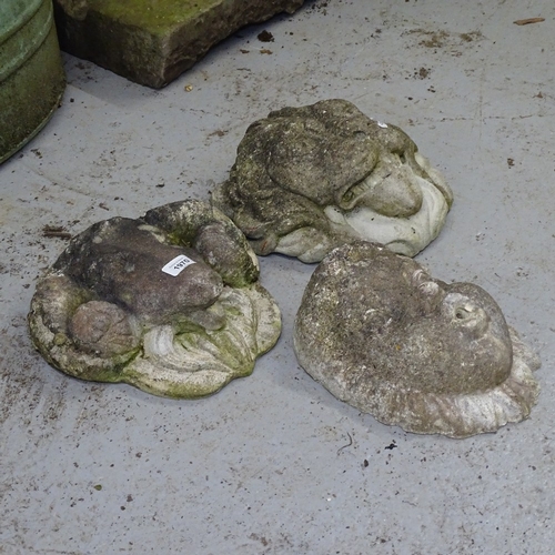 1970 - 3 weathered concrete wall plaques, lion, ram, and cherub head