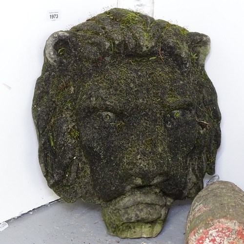 1973 - A weathered garden concrete lion-mask wall fountain, H45cm