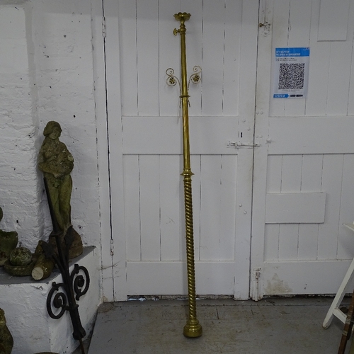 1978 - A brass Gothic design spiral turned candle stand, H180cm