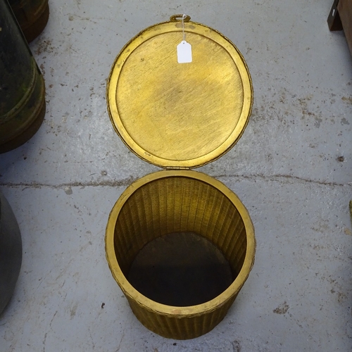 1981 - A circular gold Lloyd Loom laundry bin