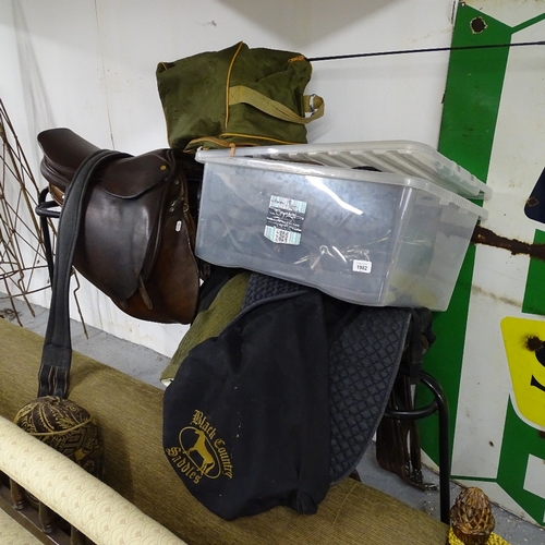 1982 - A quantity of horse riding equipment and accessories, to include 3 leather saddles, bridles, harness... 