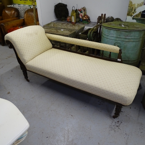 1984 - An Edwardian upholstered and carved framed chaise longue, L175cm