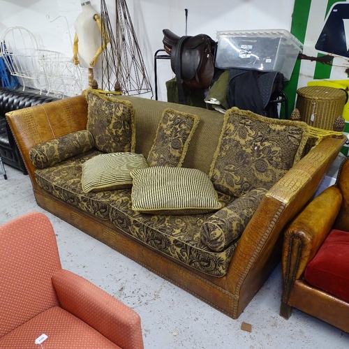 1985 - A large faux crocodile and upholstered Knoll style 3-seater settee, with loose cushions, originally ... 