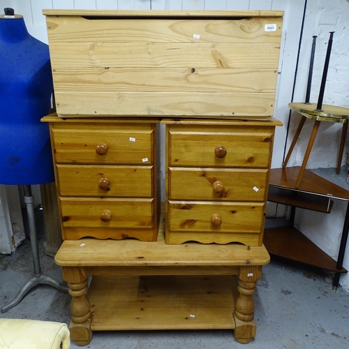 2003 - A pair of pine 3-drawer bedside chests, a pine 2-tier coffee table, and a toy box